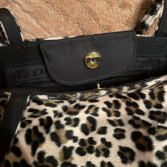 Soft faux fur leopard purse. Snap top; inside zipper pocket. - Picture 2 of 2